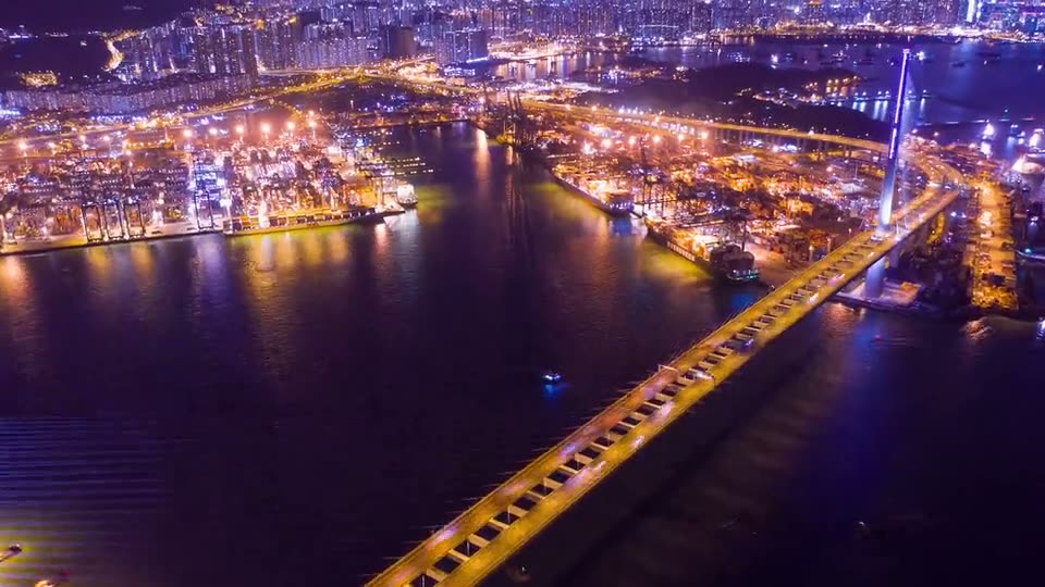 Febc Group project — an aerial night view of a lit-up port and bridge