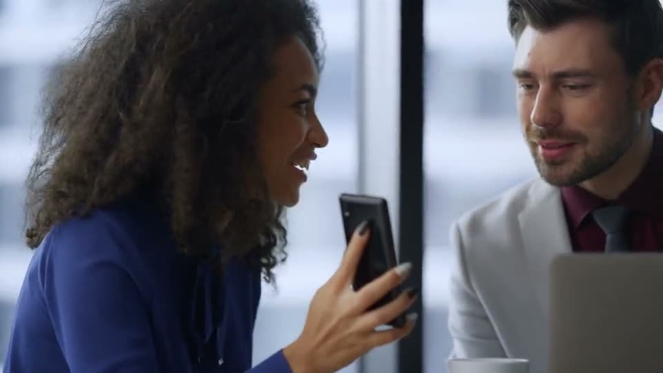 GreatPeople project — a smiling woman on a video call with a colleague
